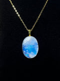 The Blue Aura Stone – Rainbow Moonstone Necklace